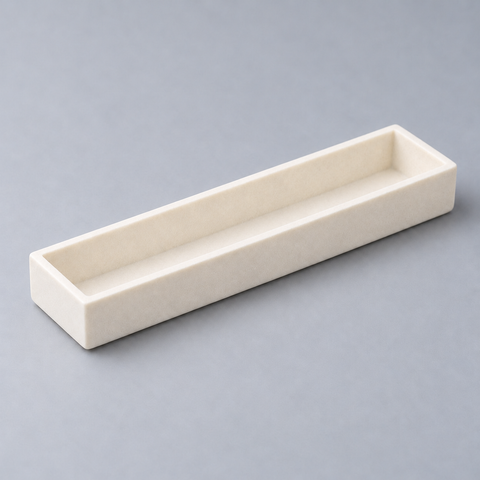 Representative image of Boron Nitride Boat: flat-bottom rectangular boron nitride ceramic boat with equal-height straight walls.