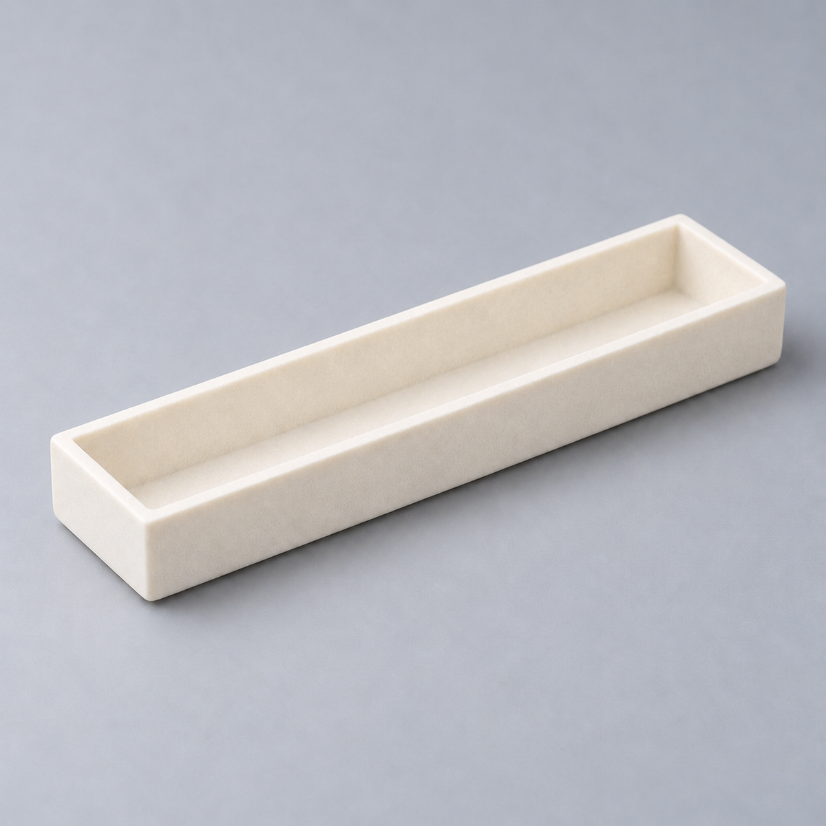 Representative image of Boron Nitride Boat: flat-bottom rectangular boron nitride ceramic boat with equal-height straight walls.