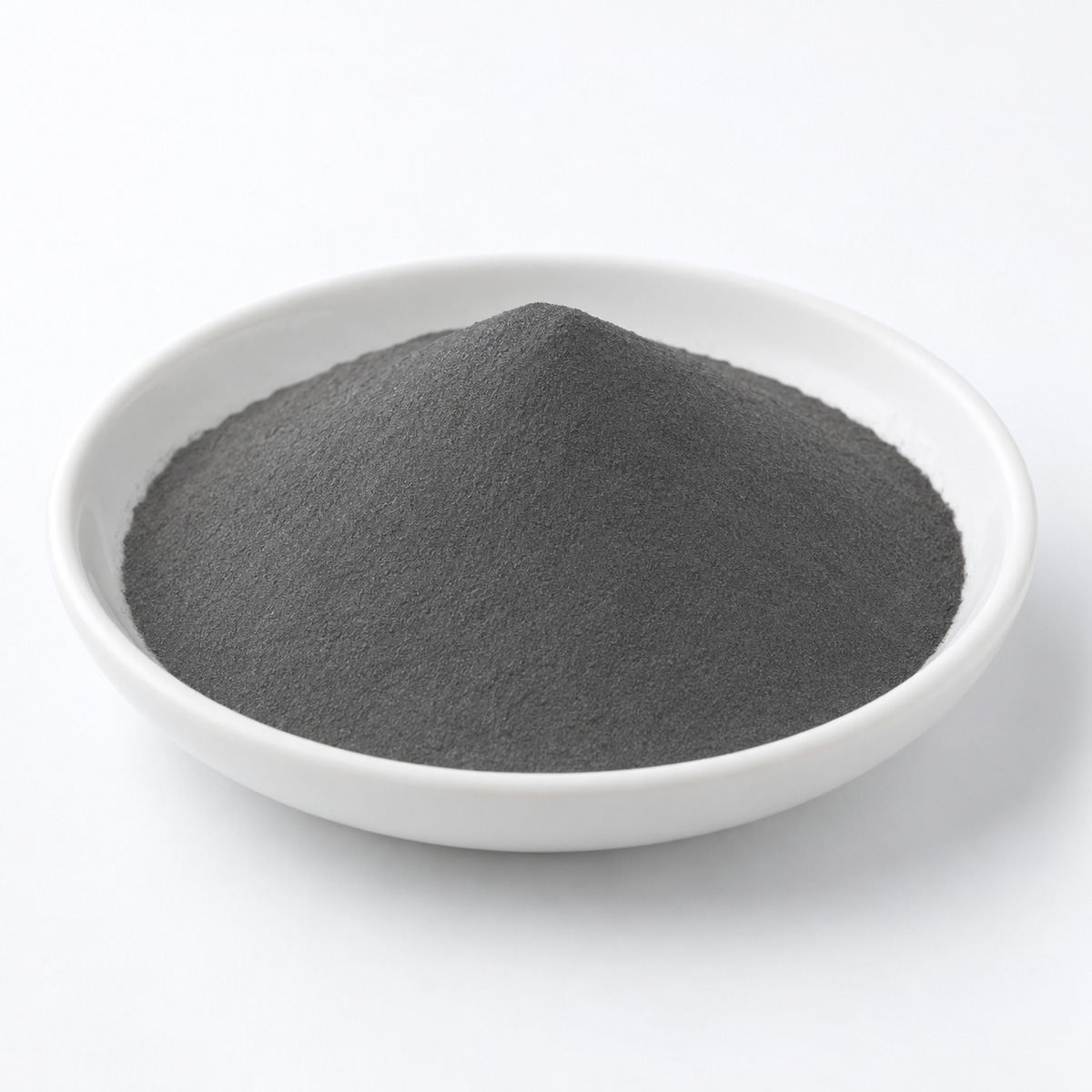 Representative image of FeCrNi High-Entropy Alloy Spherical Powder: fine dark gray FeCrNi alloy powder in a white dish
