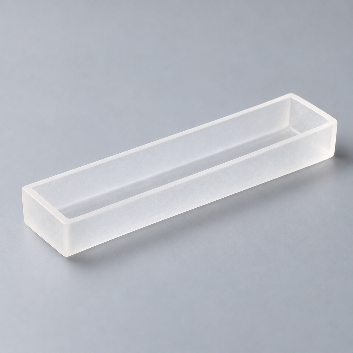 Representative image of Fused Silica Boat: flat-bottom rectangular translucent fused silica boat with equal-height straight walls.