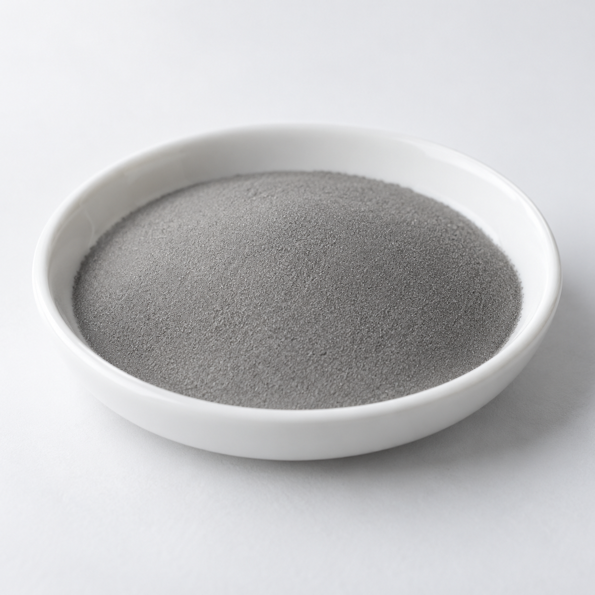 Representative image of L605 Cobalt Alloy Spherical Powder: fine neutral gray Haynes 25 L605 spherical cobalt alloy powder in a white dish